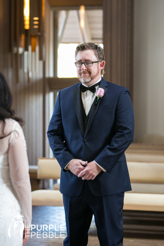 Groom gets emotional when he sees his bride during their first look