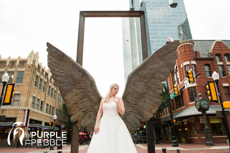 bridal portrait wings of the city