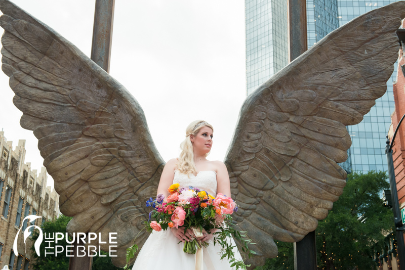 bridal portrait wings of the city